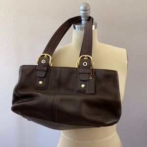 Coach leather handbag with buckles